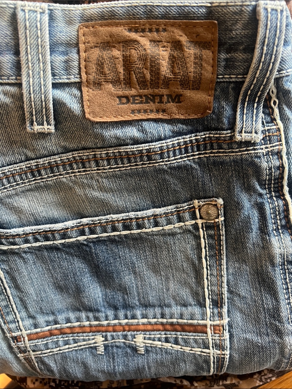 Ariat Light Blue Denim Jeans with Brown Leather Patch